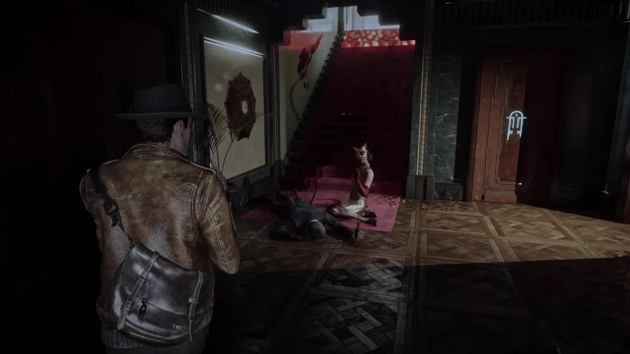 A masked woman beside a body in a red-lit mansion foyer